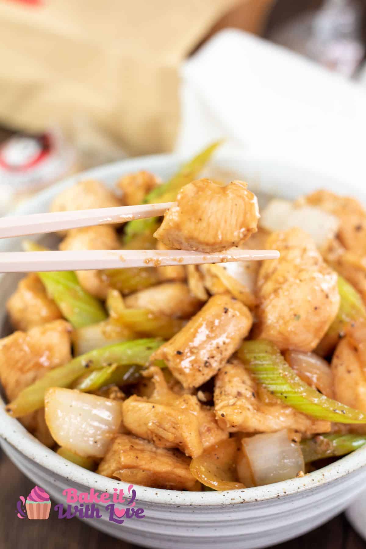 Perfectly tasty homemade Panda Express black pepper chicken with tender chunks of marinated chicken wok fried with celery and onion.