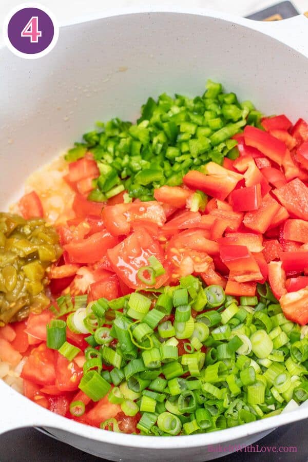Chicken tortilla soup process photo 4 add diced tomatoes, chopped jalapeno, diced red bell pepper, and green chiles.