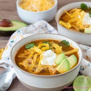 Tasty, easy chicken tortilla soup recipe with lots of flavorful chicken, black beans, corn, tomatoes, peppers, and more.