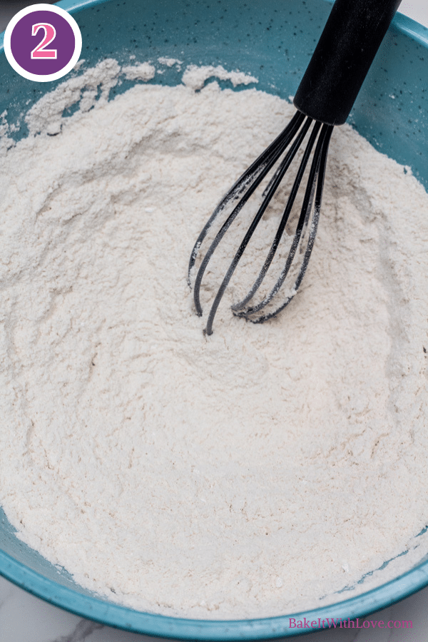 Master scones recipe process photo 2 whisk and make a well in the center of the dry ingredients.