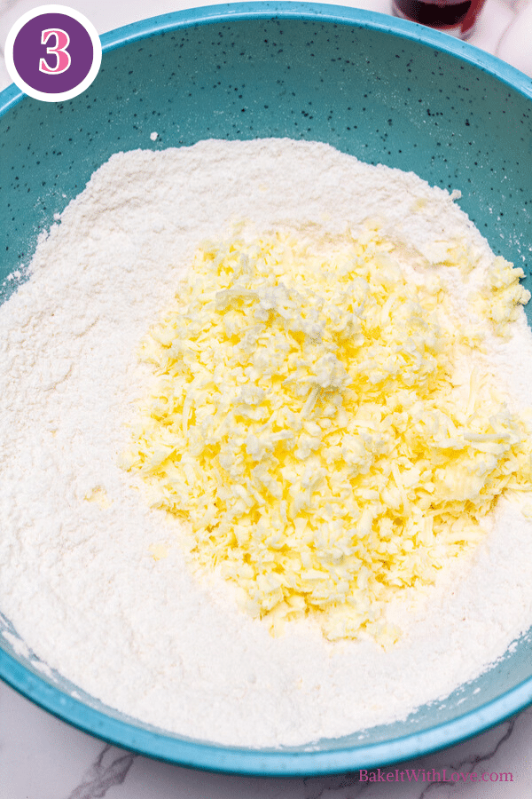 Master scones recipe process photo 3 add the grated frozen butter.