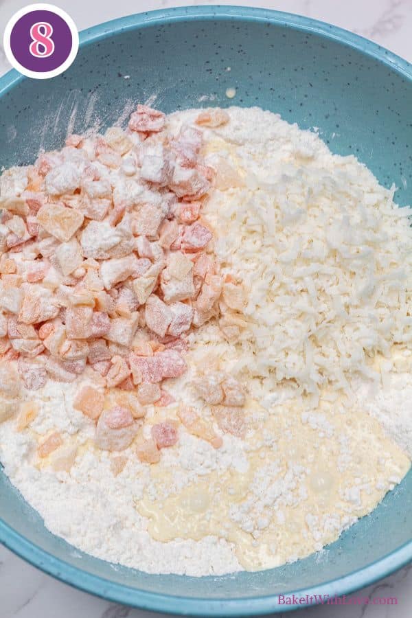 Tropical fruit scones process photo 5 add wet ingredients, diced dried fruit, and shredded coconut.