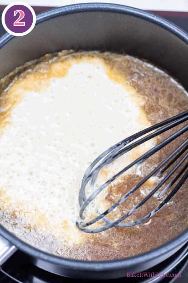 Ham gravy process photo two showing the dry ingredients and ham broth plus drippings getting whisked together in a sauce pan.