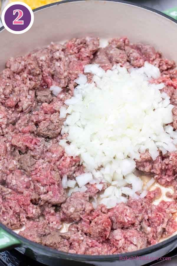 Hamburger pie casserole process photo 2 showing the minced onion added to the ground beef browning in the skillet.