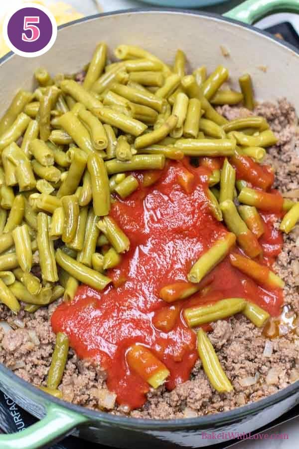 Hamburger pie casserole process 5 showing green beans and tomato sauce added to the beef and onion mixture.